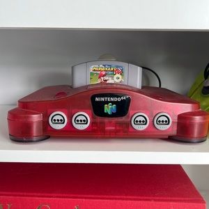 COPY - Pink Nintendo 64 with games and 3 controllers